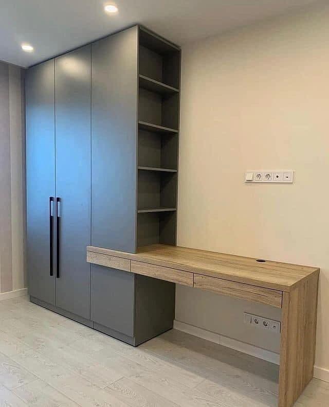 Graphite wardrobe with open shelving and oak desk return - bespoke joinery by Royalwoods Interiors, Nairobi