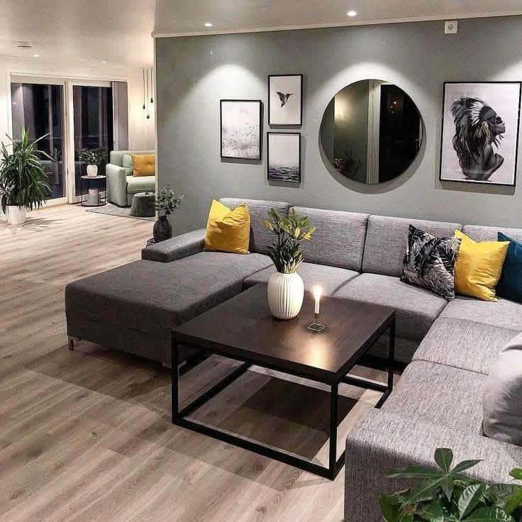 Open-plan lounge styling with paired round mirrors and layered lighting - bespoke joinery by Royalwoods Interiors, Nairobi