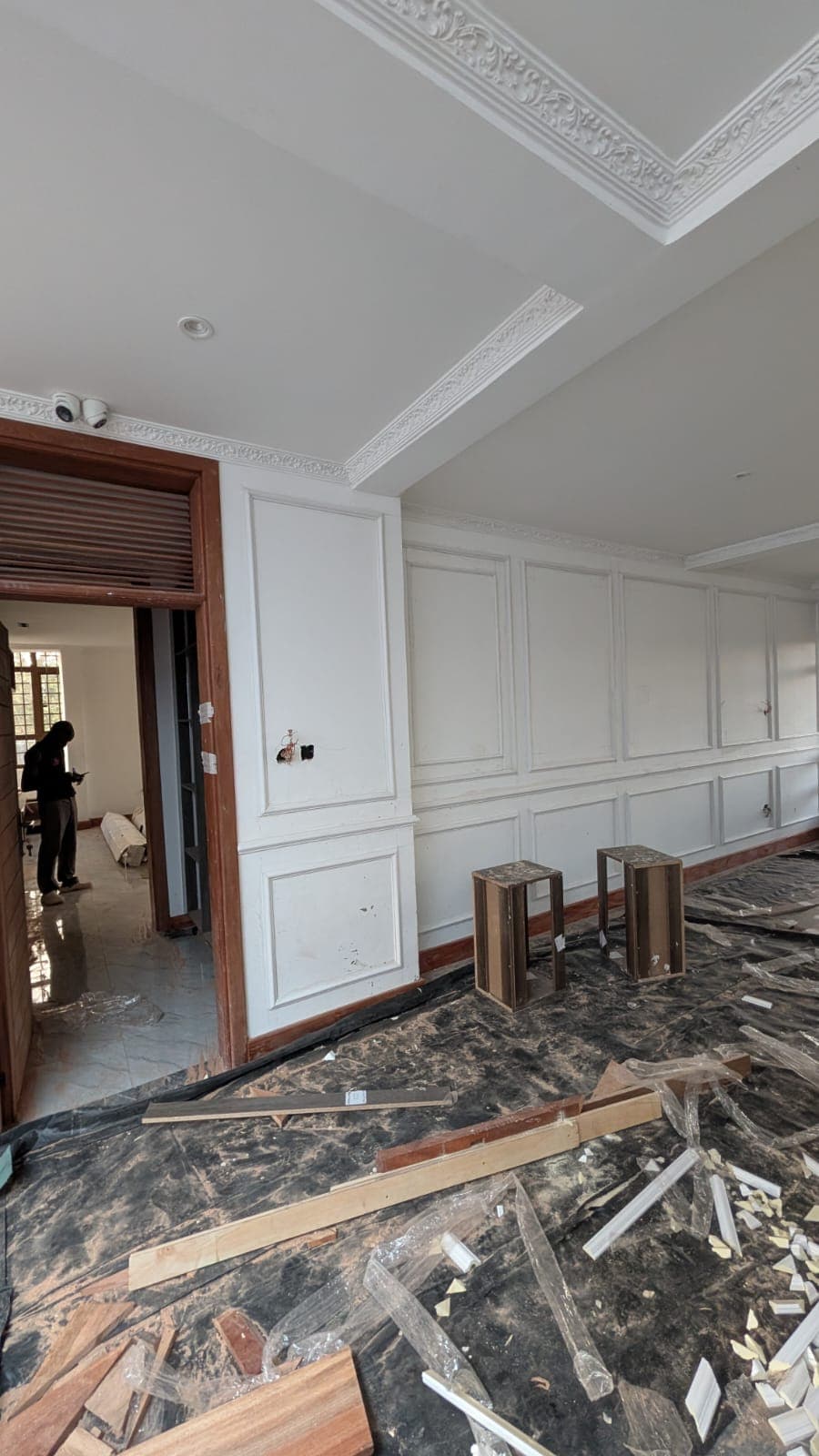 Ornate ceiling cornice and panelled wall by Royalwoods Interiors